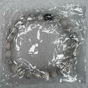 new men's bracelet in its box as it appears in the photo